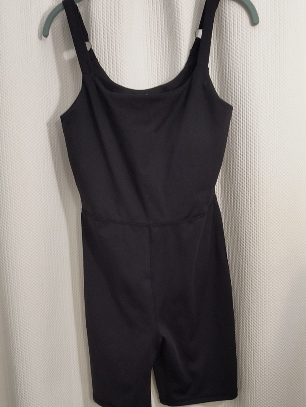Move Theology Classic Black Sleeveless Romper Womans